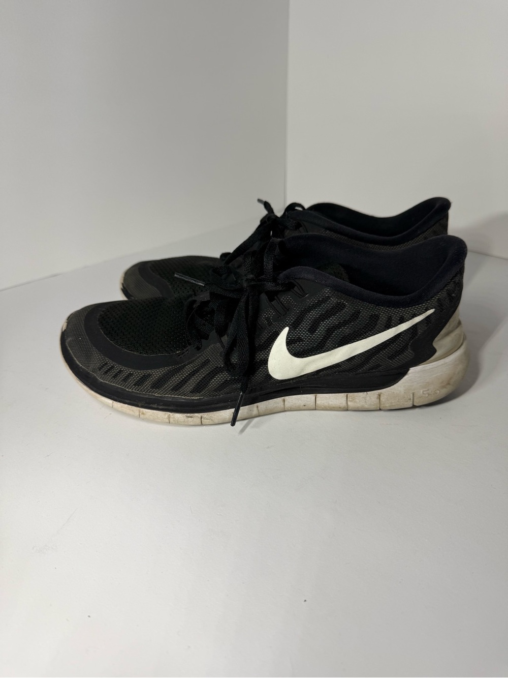 Nike Women’s Black Athletic Shoes with White Swoosh